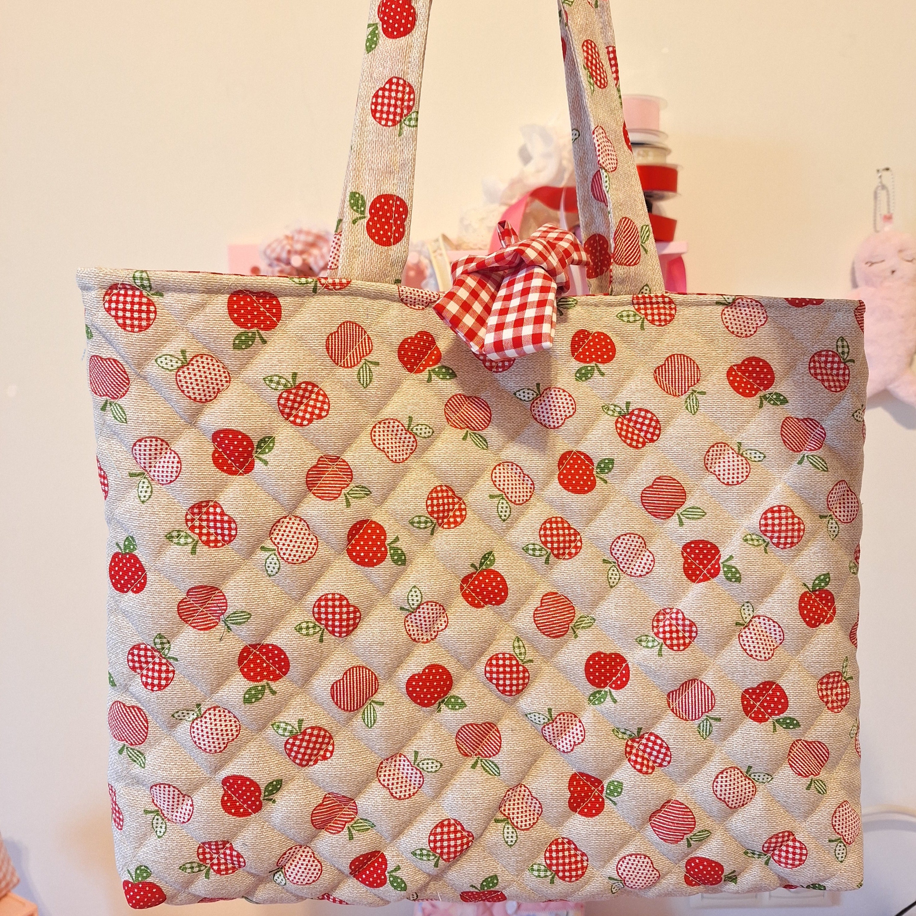 Bolso acolchado de manzanas